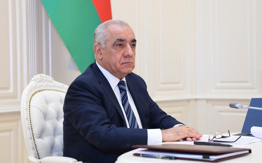 Ali Asadov speaks on phone with his Kyrgyz counterpart