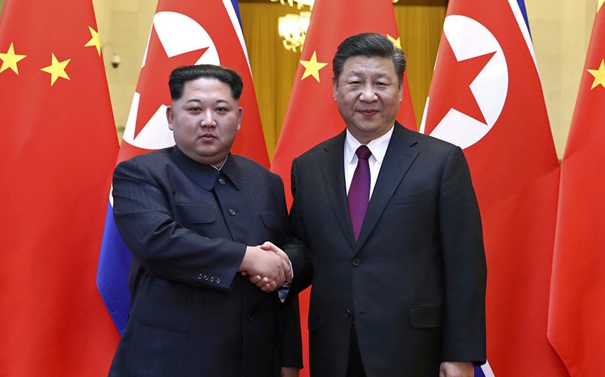 Ким Чен Ын совершил свой первый международный визит и провел переговоры с Си Цзиньпином в Пекине