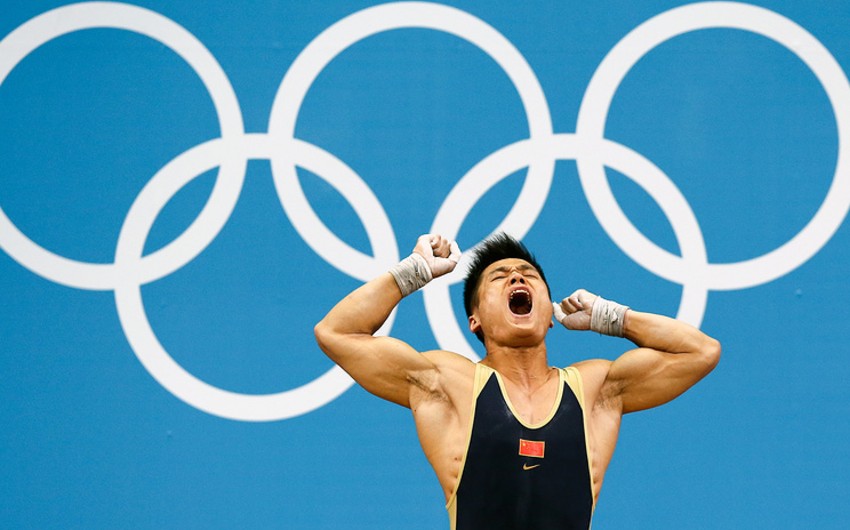 ​Çin ağır atleti Rio-2016-da birdən qaldırmada dünya rekordu vurub
