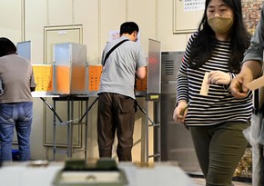 Правящая в Японии партия выигрывает выборы в заксобрание Токио