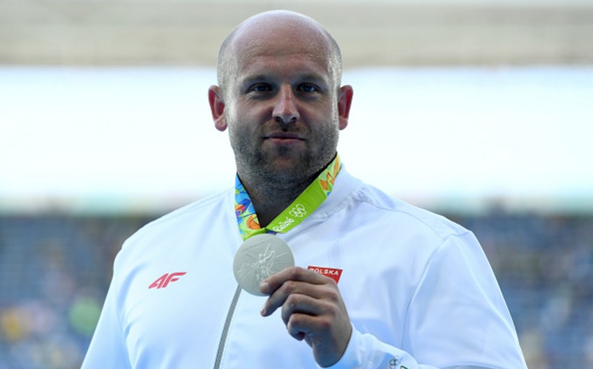Польский атлет продал свою олимпийскую медаль для оплаты лечения больного ребенка