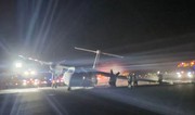 Air Canada flight skids off runway and catches fire; airport closed