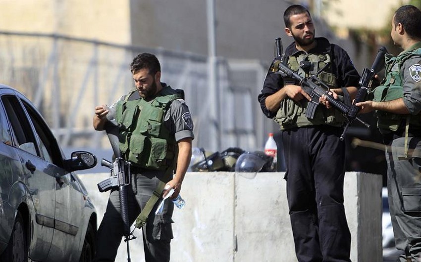 В результате столкновений между израильскими военными и палестинцами в городе Рамалла ранены 12 палестинцев