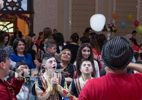 Down syndrome children perform in the event held for 92nd anniversary of the national leader