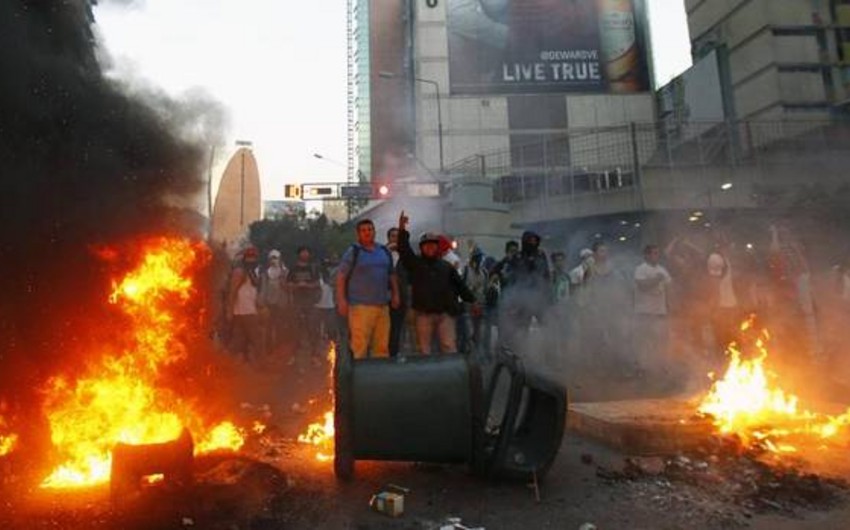 ​Очередные столкновения демонстрантов с полицией произошли в Венесуэле
