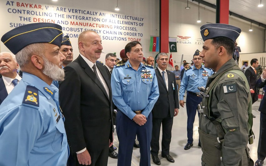 President Ilham Aliyev views military exhibition at Pakistan's National Aerospace Science and Technology Park