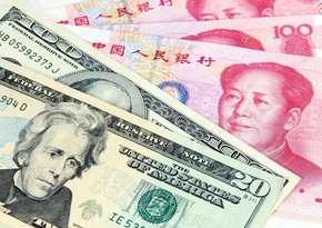 People's Bank of China strengthens yuan against dollar