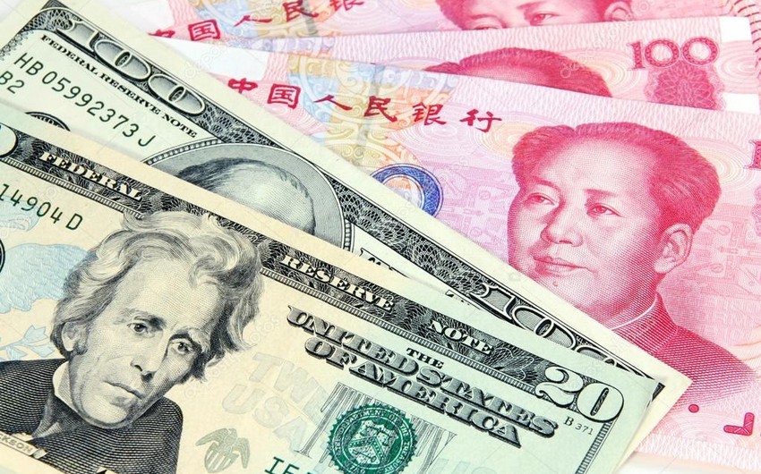 People's Bank of China strengthens yuan against dollar