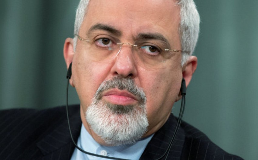 Iranian FM urges world powers to scrap nuke weapons