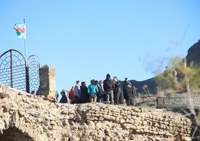 International travelers visit Khudafarin Bridge in Azerbaijan's Jabrayil