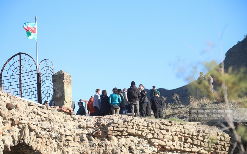 International travelers visit Khudafarin Bridge in Azerbaijan's Jabrayil