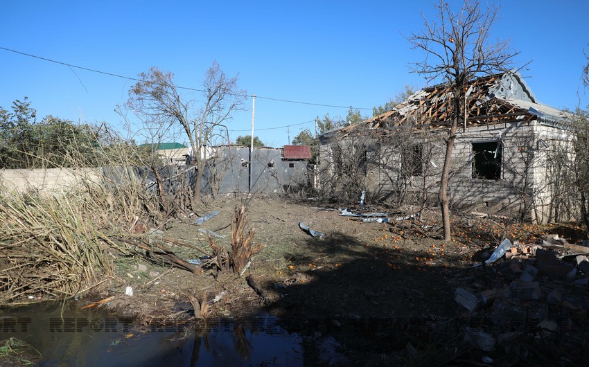 Artillery shells fired by Armenia destroy houses and shops