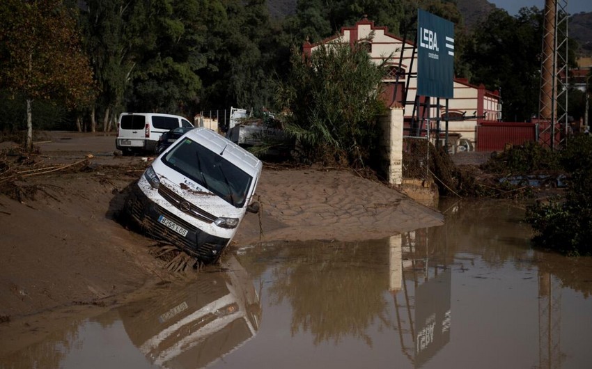 At least 63 people feared dead after torrential rain and floods in Spain