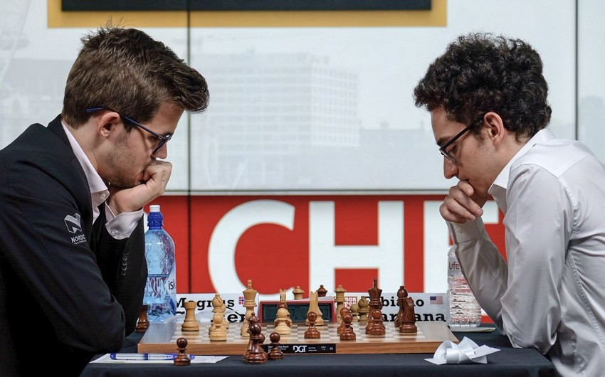 Карлсен и Каруана сыграли вничью во второй партии матча за шахматную корону