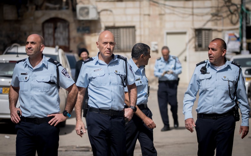 Woman arrested in Israel on suspicion of murdering son, 6, attacking security guard with axe