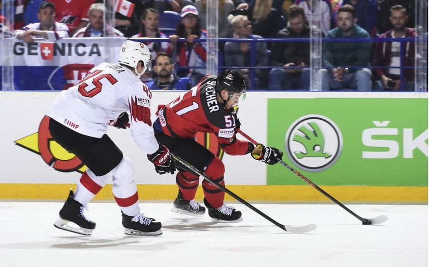 ЧМ по хоккею: Канада одолела Швейцарию, Россия обыграла США - ФОТО