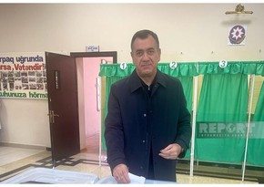 Presidential candidate Gudrat Hasanguliyev exercises his right to vote