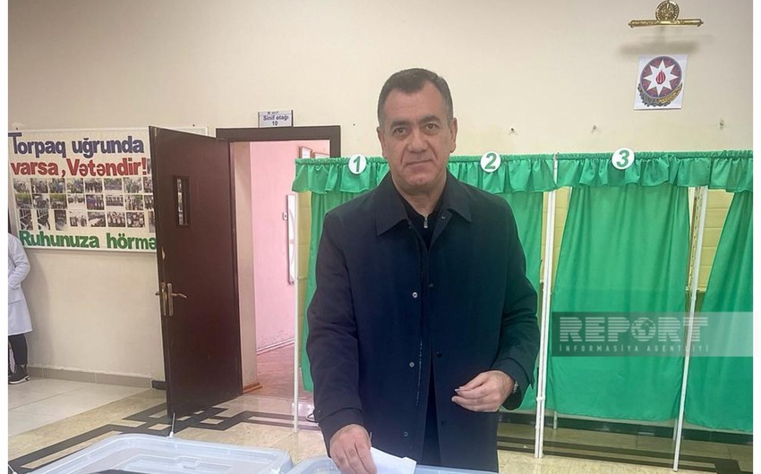 Presidential candidate Gudrat Hasanguliyev exercises his right to vote