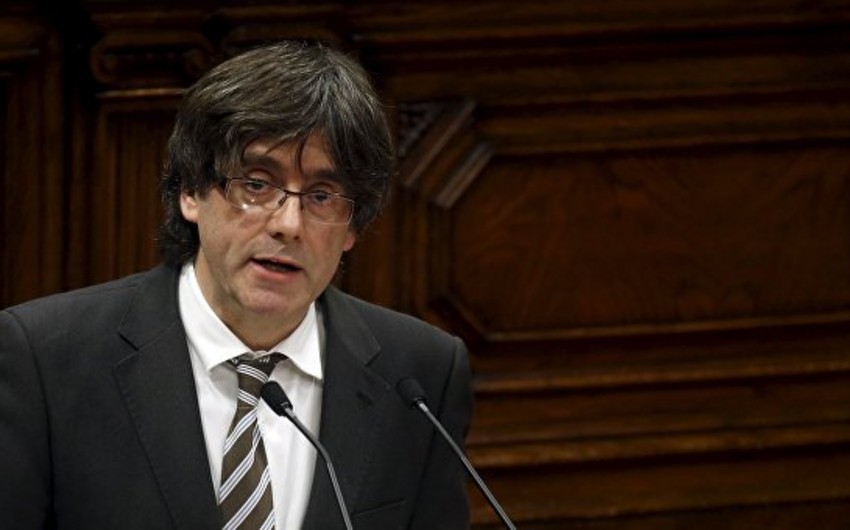 Catalonia leader sworn in without declaring loyalty to king