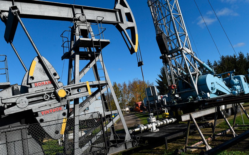 Oil companies in Europe and US  write down $145 billion in assets 