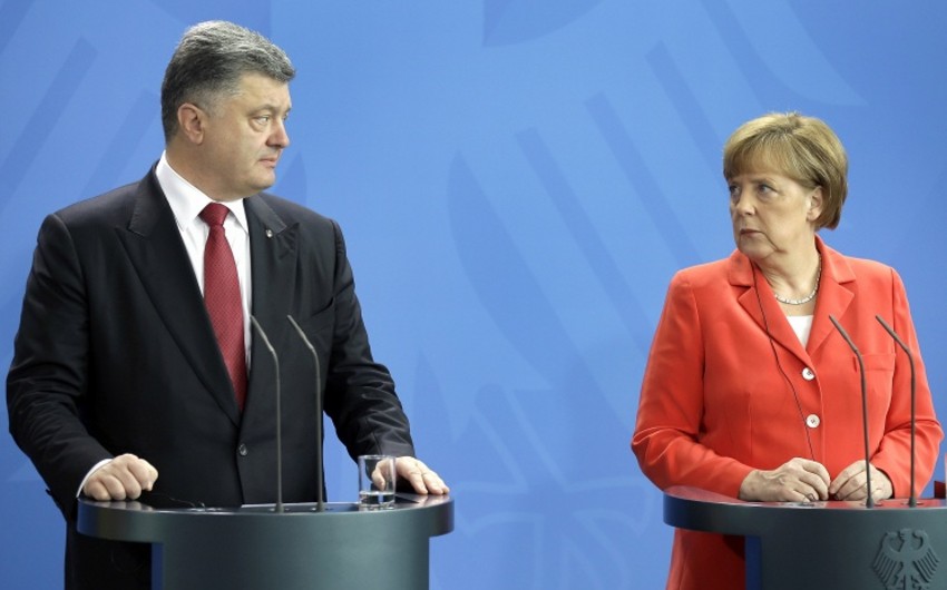 Порошенко и Меркель подтвердили безальтернативность мирного урегулирования в Донбассе