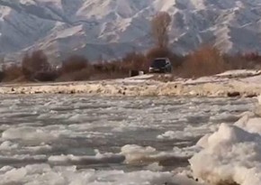 Kyrgyzstan's “never-freezing” lake shrouded in ice