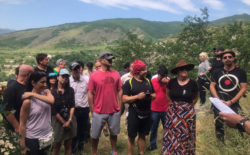 Group of travelers & bloggers from several countries visit Azykh cave in Azerbaijan