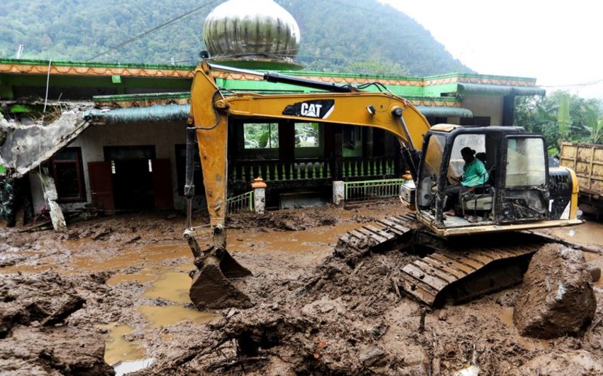 Landslides in Indonesia's Sumatra kill at least 27