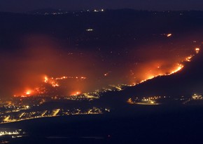 Fires rage in northern Israel after rocket attacks; key roads closed off