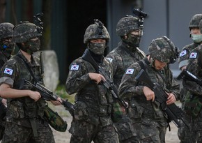 S. Korea warns N. Korea will see end of regime if it harms its people