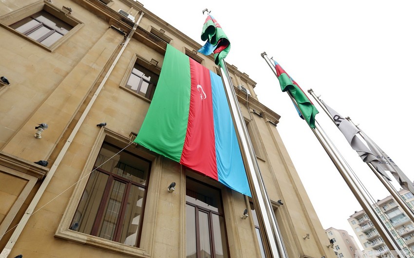Buildings wrapped in flags all around Baku