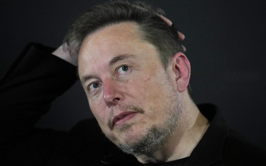 Tesla CEO Elon Musk kicks off surprise trip to Beijing