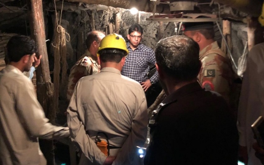 Gunmen kill 20 miners and wound others in an attack in southwest Pakistan