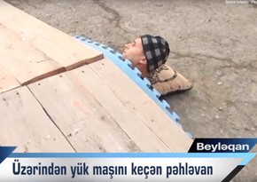 Beyləqanda pəhləvanın üzərindən 12 dəfə yük maşını keçib - VİDEO