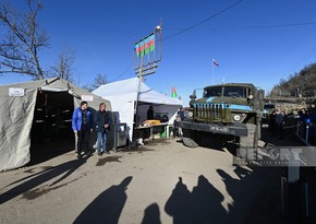 Security vehicles of Russian peacekeepers moving freely on Khankandi-Lachin road