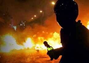 Police car destroyed, officer injured in Athens Molotov cocktail attack