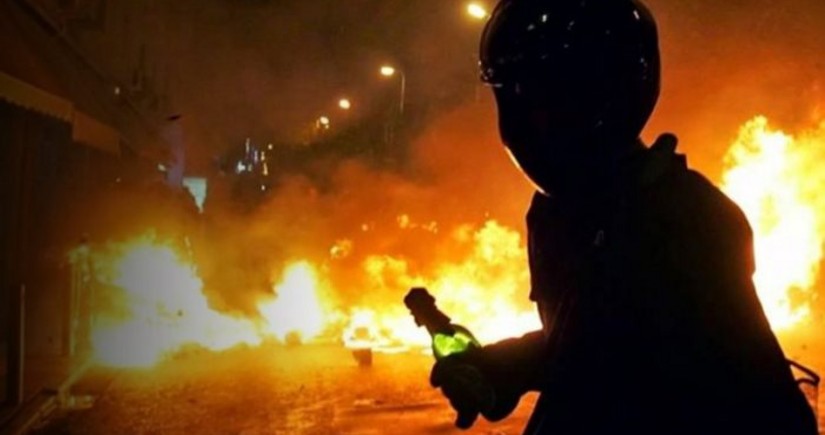 Police car destroyed, officer injured in Athens Molotov cocktail attack