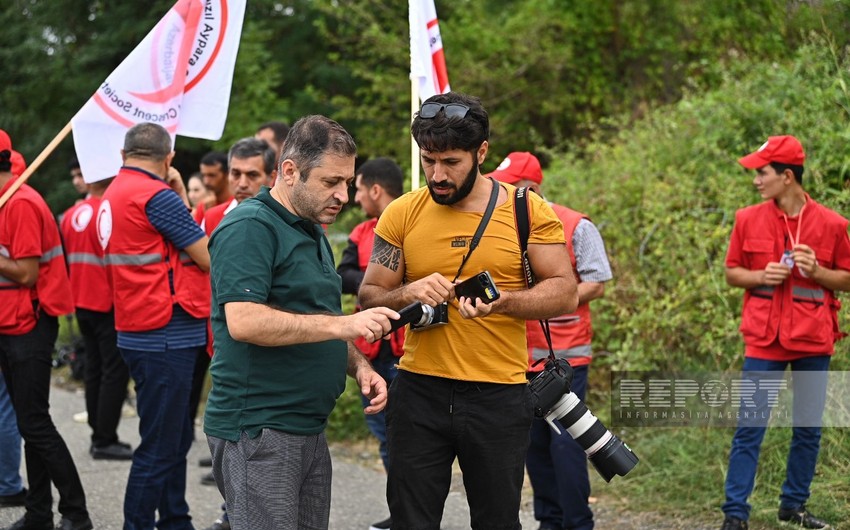 Foreign media representatives arrive at Aghdam-Khankandi road where humanitarian aid convoy stopped