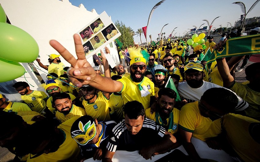 World Cup: Qatar accused of hiring 'fake fans' to parade in front of cameras 