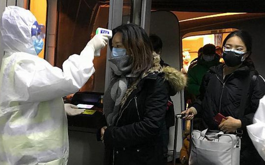 Çin polisləri koronavirus şübhəlisini belə zərərsizləşdirdi - VİDEO