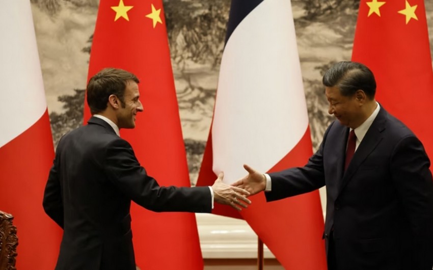 China's Xi and Macron urge 'political settlement' of Iran nuclear issue, state media reports