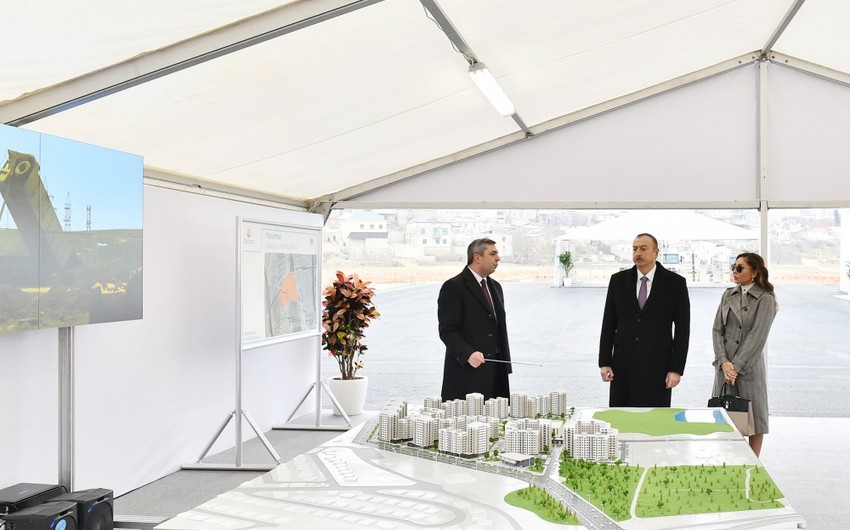 Президент Ильхам Алиев принял участие в церемонии закладки фундаментов здания школы и первого девятиэтажного жилого здания