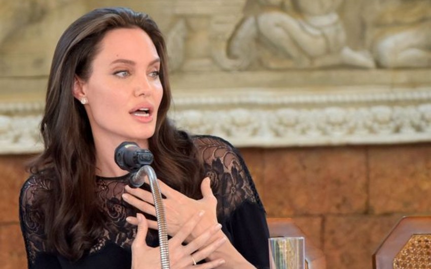 Angelina Jolie surrounded by her six children for red carpet since Brad Pitt split
