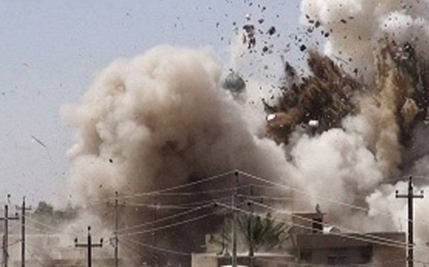 ​IS militants blow up the mosque at the grave of Saddam Hussein's father