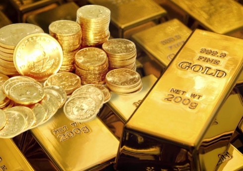 Золото дорожает на снижении курса доллара
