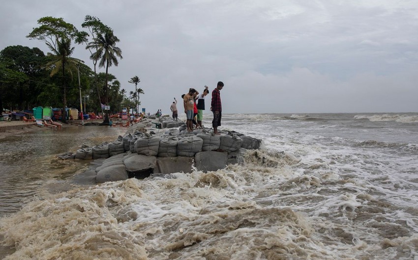 Cyclone kills 16 in India, Bangladesh and cuts power to millions