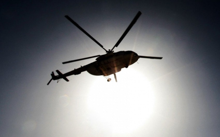 Military helicopter trapped by militants crash-landed in Afghanistan