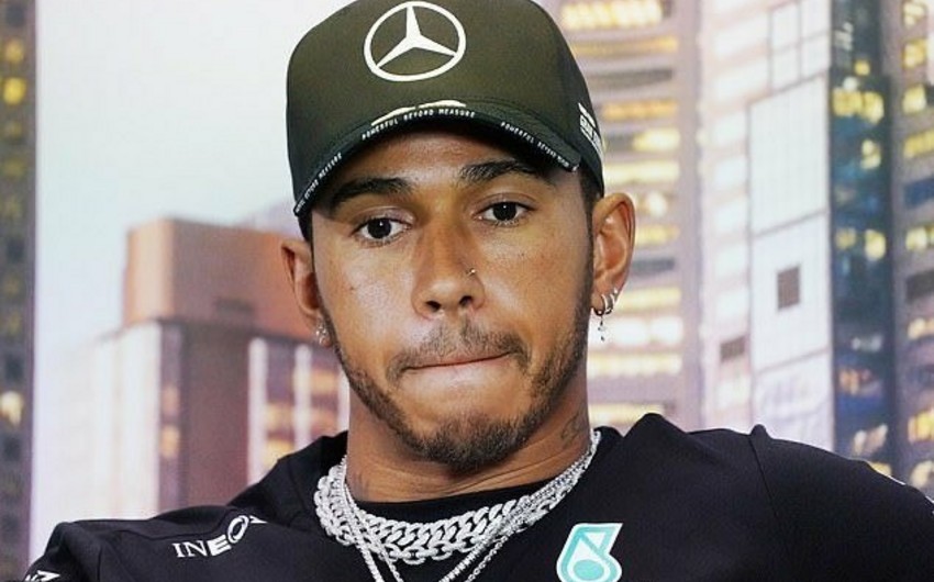 Lewis Hamilton takes part in anti-racism protests in London