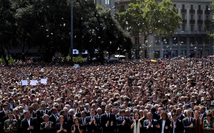 Barcelona holds march of thousands in memory of terrorist attack victims