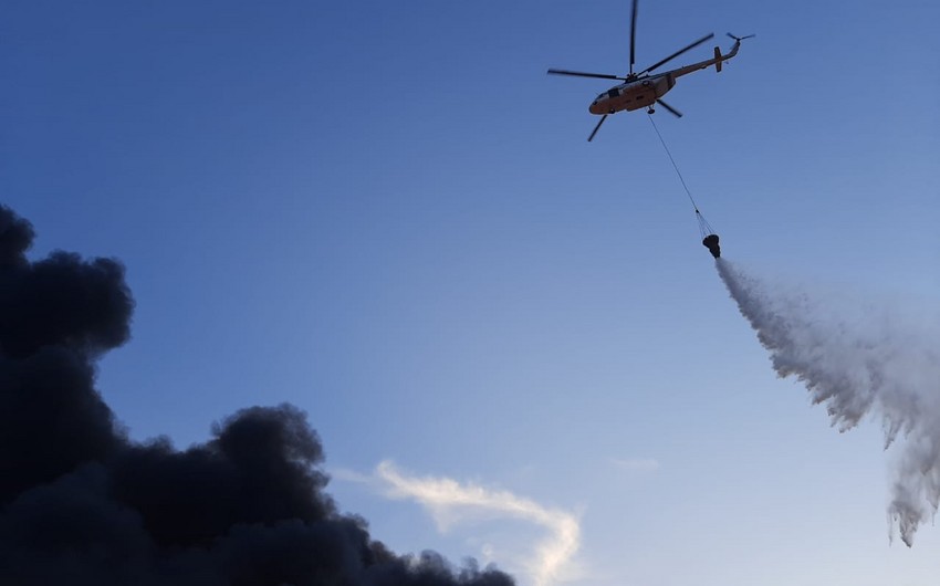 К тушению пожара в Сумгайыте привлечены вертолеты и войска гражданской обороны